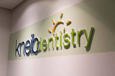 kneib dentistry logo on wall erie pa